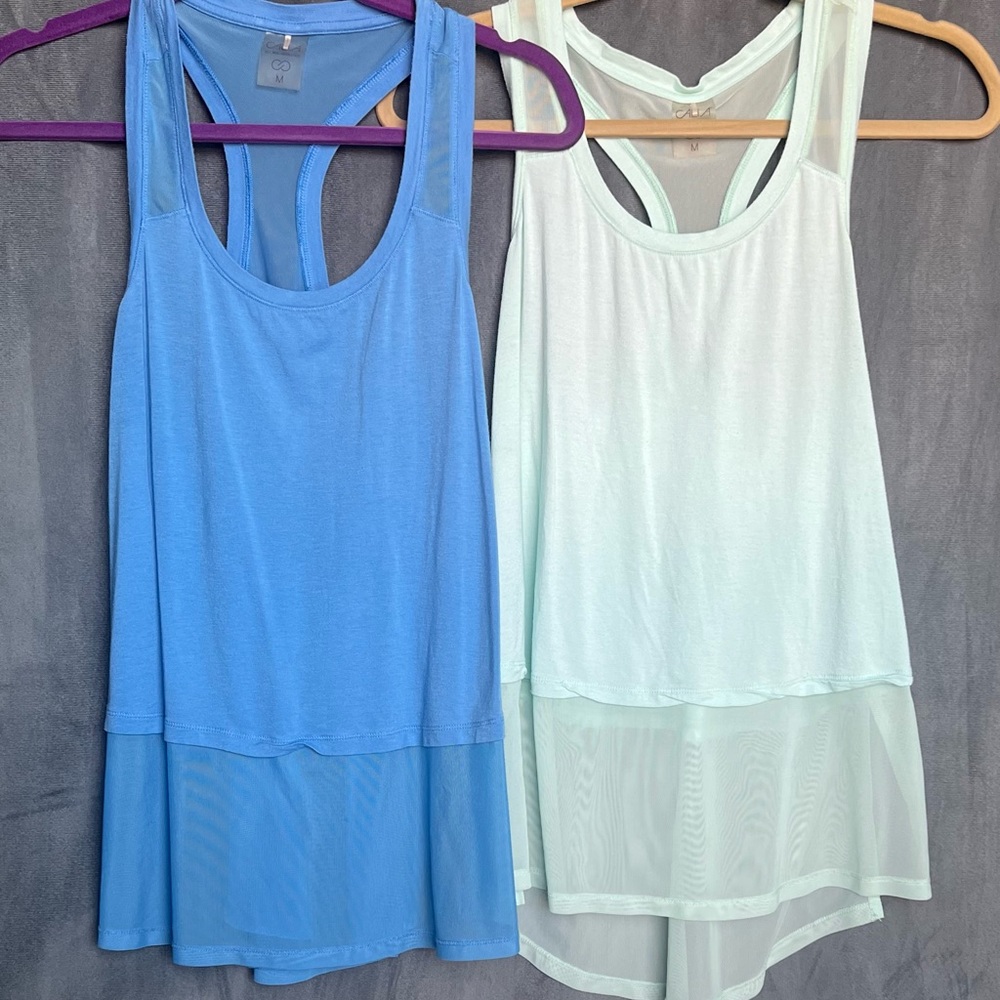 Calia by Carrie Underwood Racerback Tanks